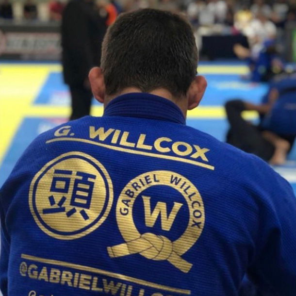 Custom gold patches on a blue Atama BJJ Gi