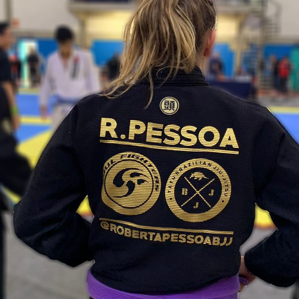 Custom team and name patches on a black Atama BJJ Gi